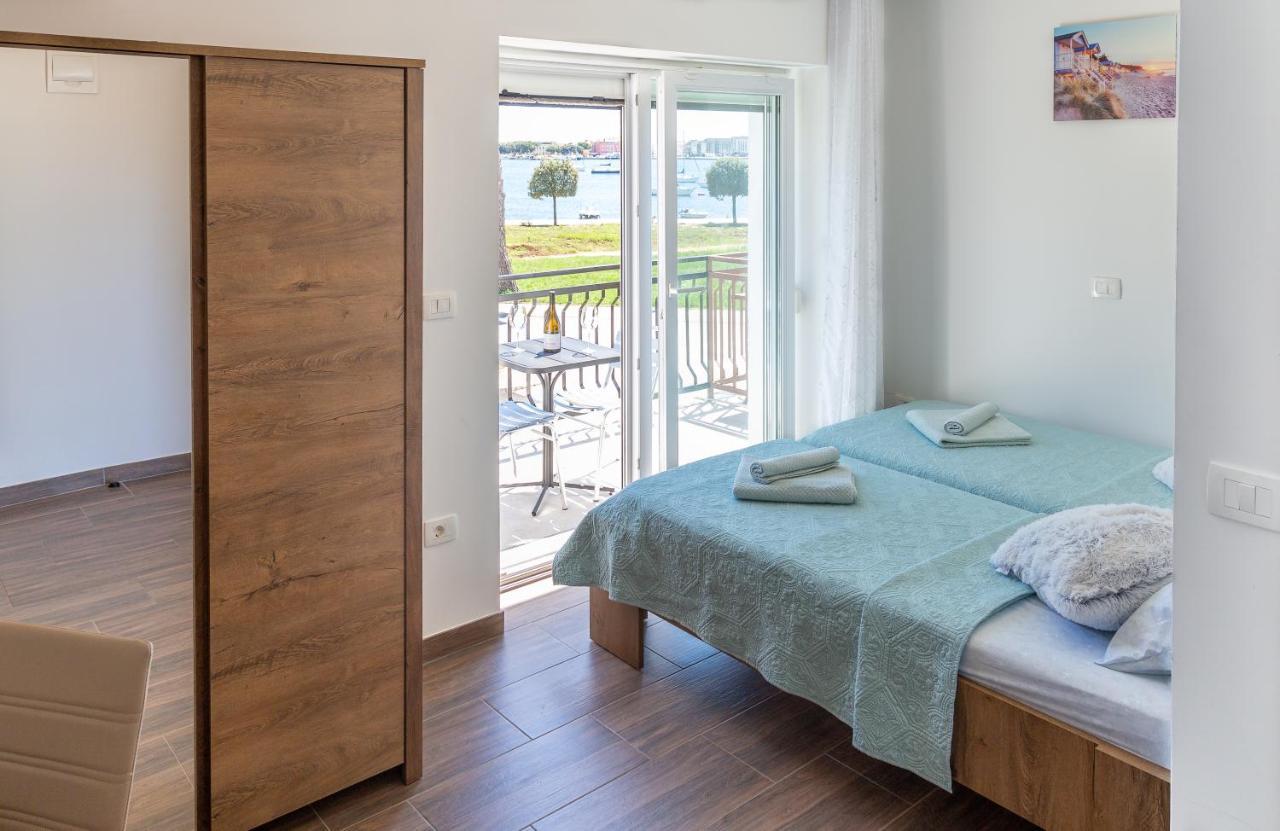 Deluxe Tweepersoonskamer met 2 Aparte Bedden en Uitzicht op Zee
